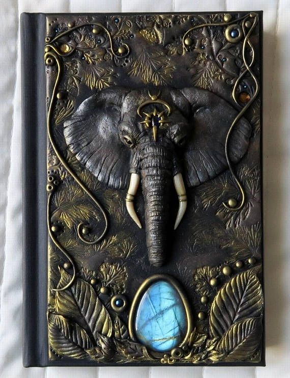 570x742, 93 Kb / книга, слон, переплет, тиснение, кожа, лабрадорит