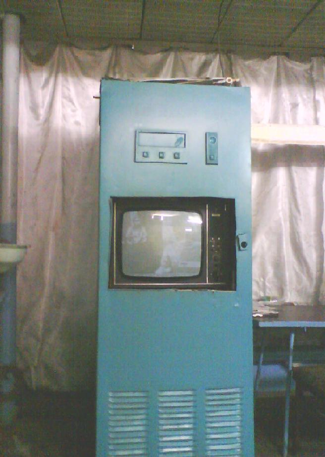 656x921, 64 Kb / автомат, шкаф, телевизор