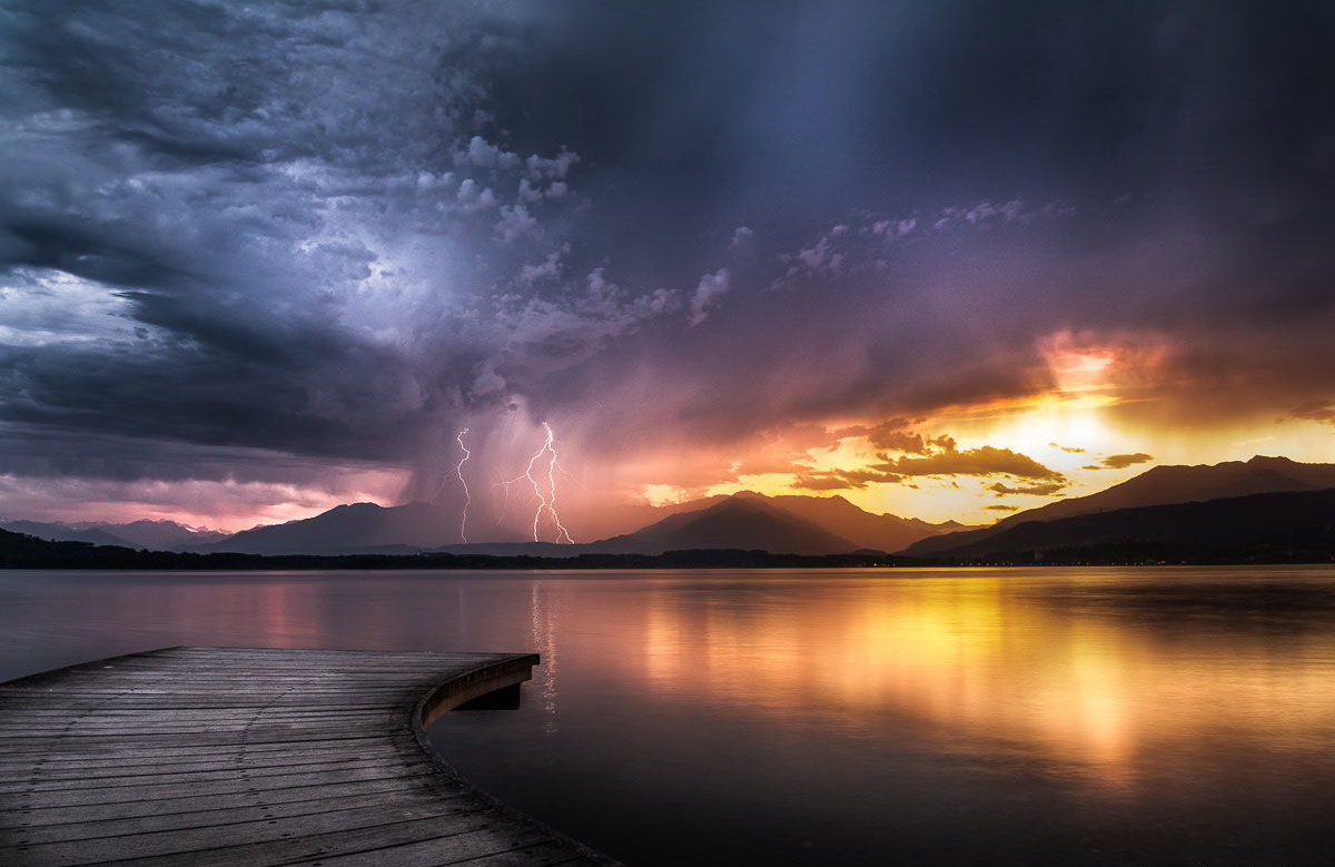 1200x779, 201 Kb / закат, мост, гроза, горы, облака, вода