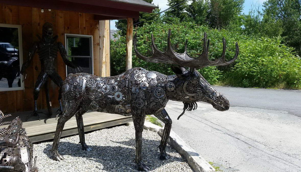 1178x675, 208 Kb / лось, шестеренки, хищник, скульптуры, металл